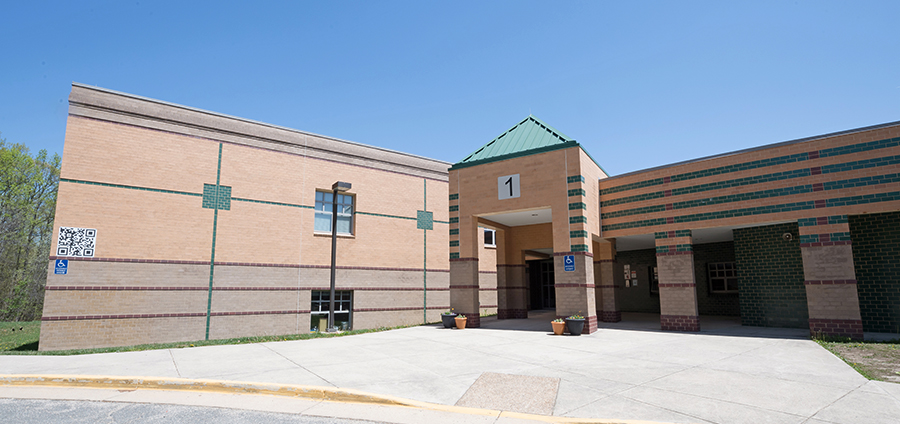 Color photograph of the main entrance of Halley Elementary School. 